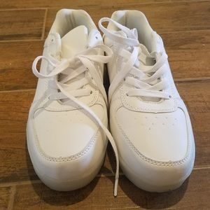 LED FLO shoes with charging cable.